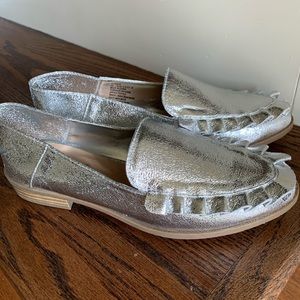 Metallic silver flats with ruffle detail